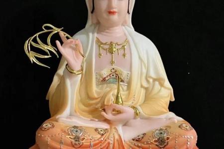 观音菩萨坐什么花